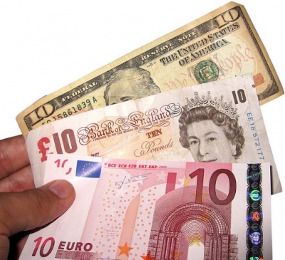 notes of various currencies, dollars, pounds, euros